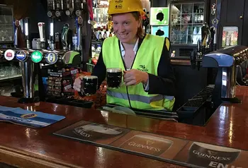 Heritage Minister Tracey Crouch pulling pints at The Fellowship Inn, Bellingham, South London