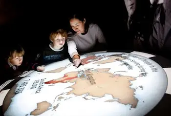 Children examine an exhibit at the National Army Museum