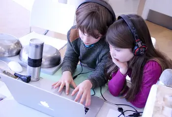 Children use a computer