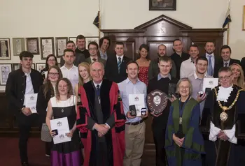 A group of people posing for a photo