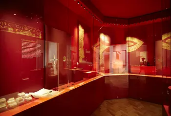 The Staffordshire Hoard Gallery with objects on display in glass cases