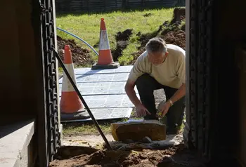 A stonemason gets to work at St Mary's Church Wreay