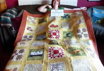 Interviewee Julie Edwards and her quilt