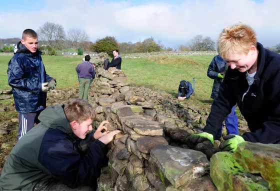 Participants learn dry stone walling on an HLF-supported Heritage Grants project