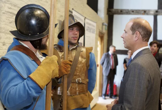 His Royal Highness Prince Edward talks to people in Civil War era outfits