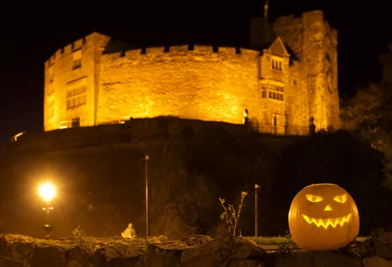 Tamworth castle at night with jack o'lantern