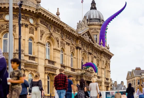 The outside of the Hull Maritime Museum, under renovation, with sea monster tentacles appearing out the top