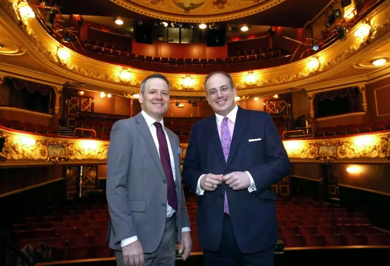 Two men in a theatre