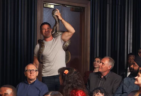 Steve Backshall holding a snake