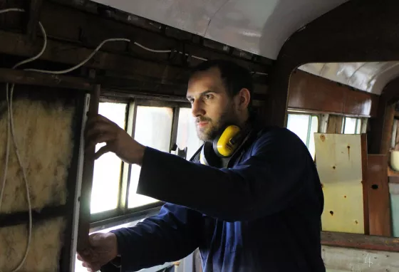 Alex Luckham working on a steam train