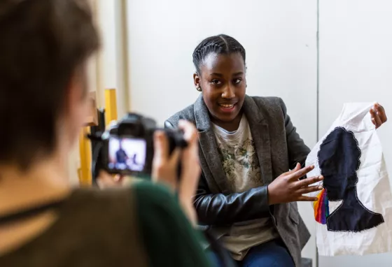 Young woman talks to camera