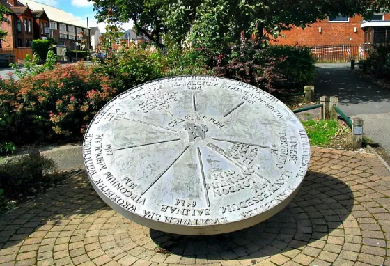 Stone dial indicating distances to various places from Chesterton