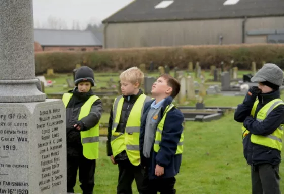 Children deep in their research at Emneth War Memorial