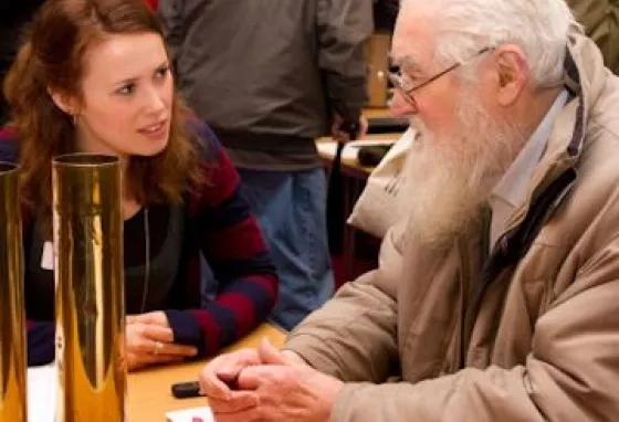 Discussing artefacts at the First World War Road Show, Morley Town Hall