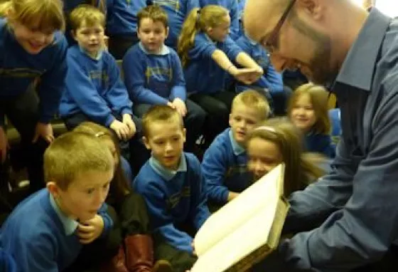 Children participating in learning activities with The Scottish Council on Archive