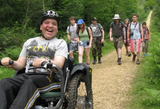 Wheelchair user joining walking group