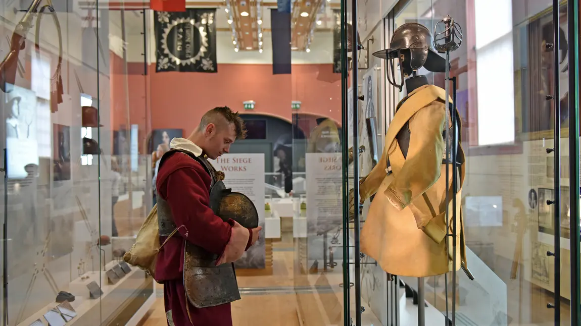 A re-enactor examines an exhibit at the Civil War Centre