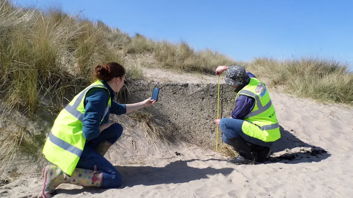 CITIZAN volunteers measuring on a beach