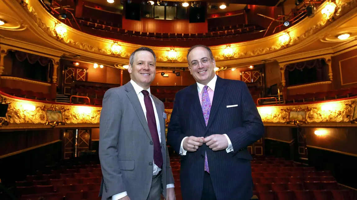 Two men in a theatre