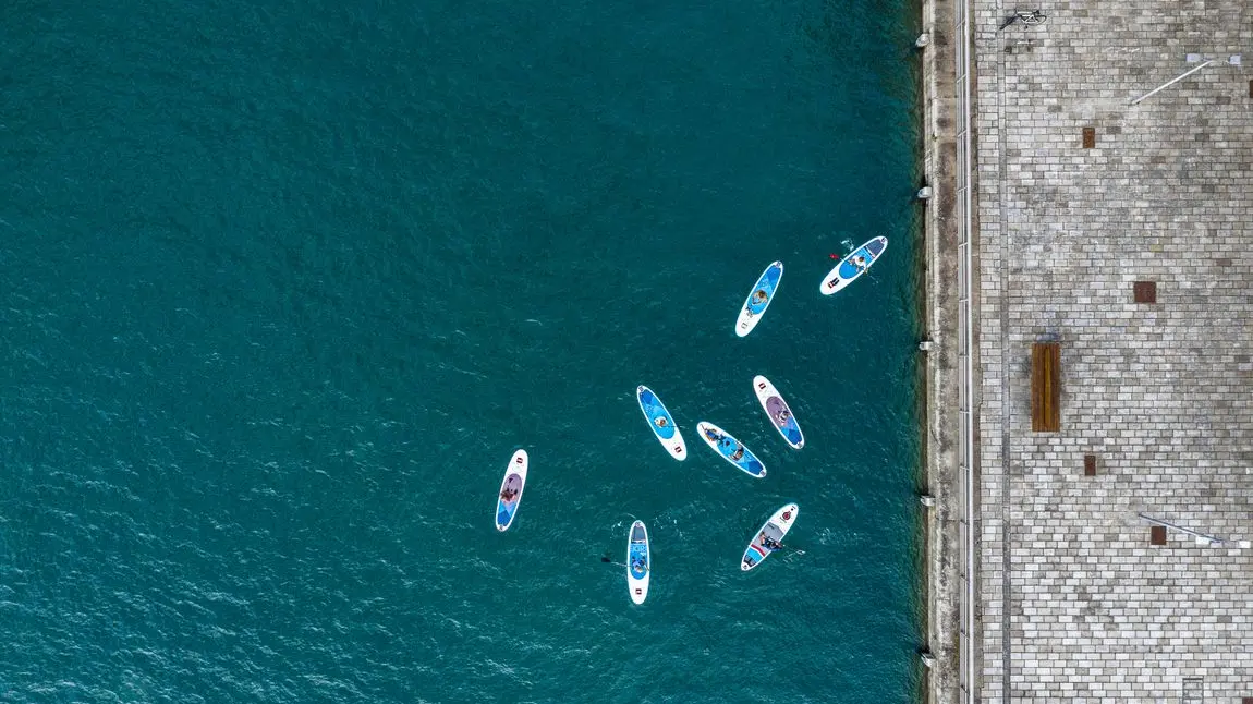 Paddleboarders in Royal William Yard, Plymouth