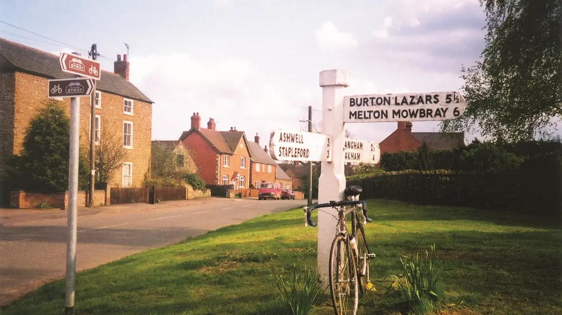 A bicycle and sign on the National Byway