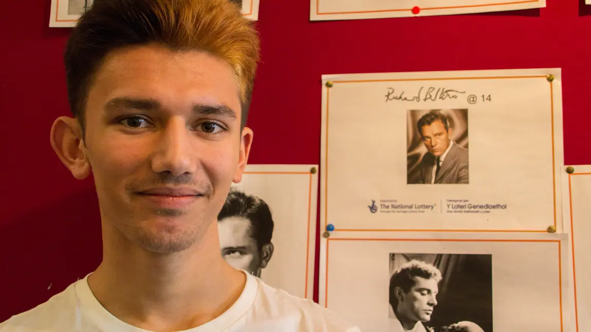 Abdul next to the project display