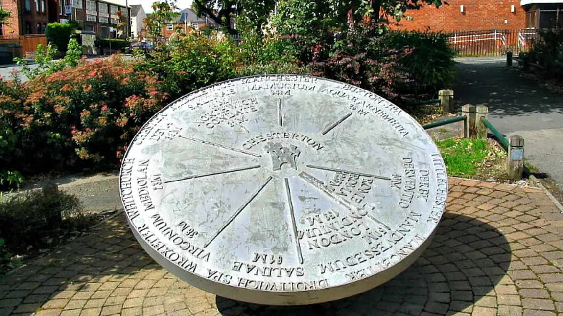 Stone dial indicating distances to various places from Chesterton