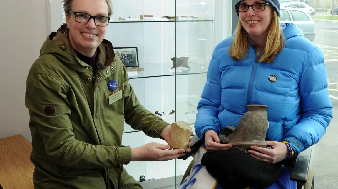 Volunteers Wayne and Antoinette with archaeological finds