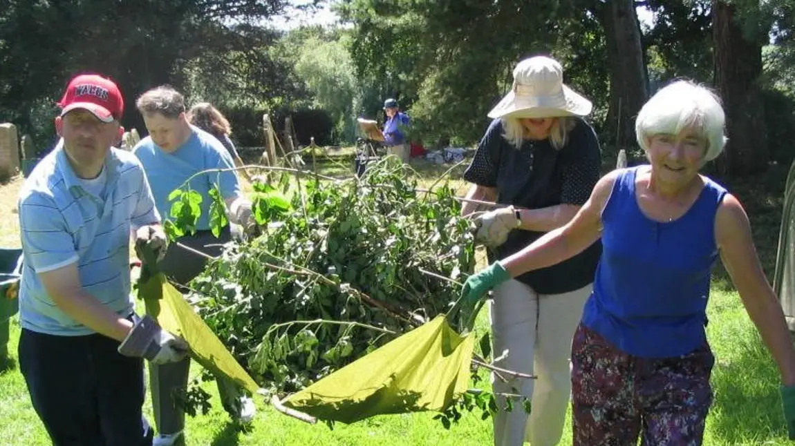 Volunteers in Hatfield churchyard, Herefordshire, Caring for God's Acre