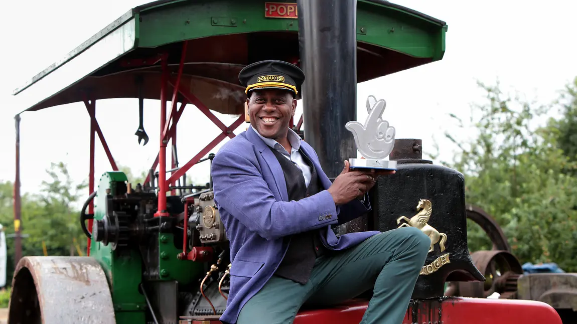 Ainsley Harriott presents National Lottery Award to staff at Lion Salt Works 