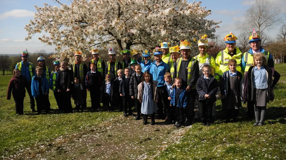 Primary school children meet construction workers and apprentices at New Bolsover Model Village