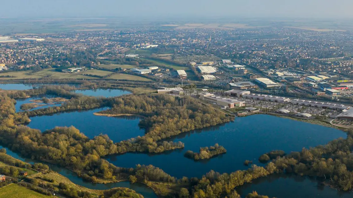 A visual of Skew Bridge Lake with the planned retail and visitor centre in the background
