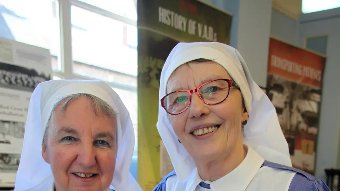 Anne Wall and Eileen Brereton in costume as First World War Red Cross nurses