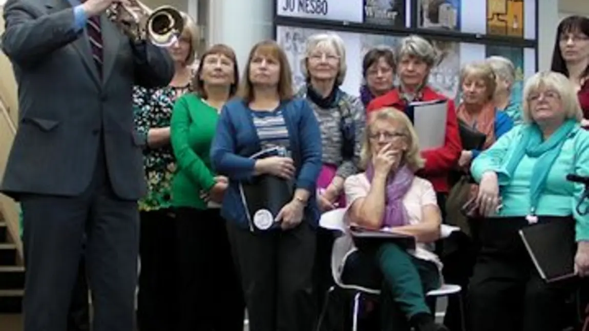 Audience listening to a rendition of The Last Post