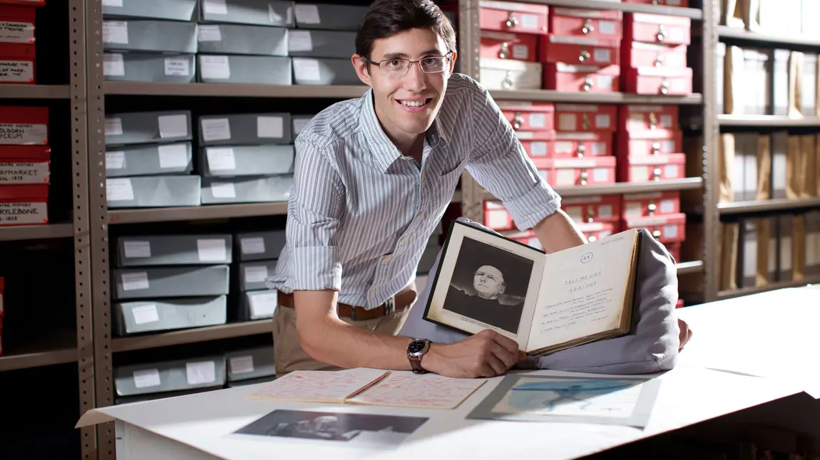 Matthew with a play script in the Peter Brook archive 