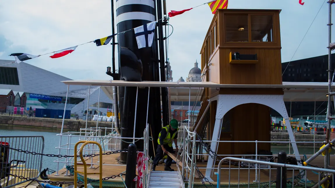 Volunteer Dave Lowles working on board the Daniel Adamson