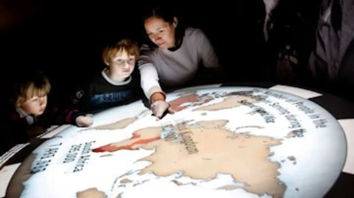 Children examine an exhibit at the National Army Museum