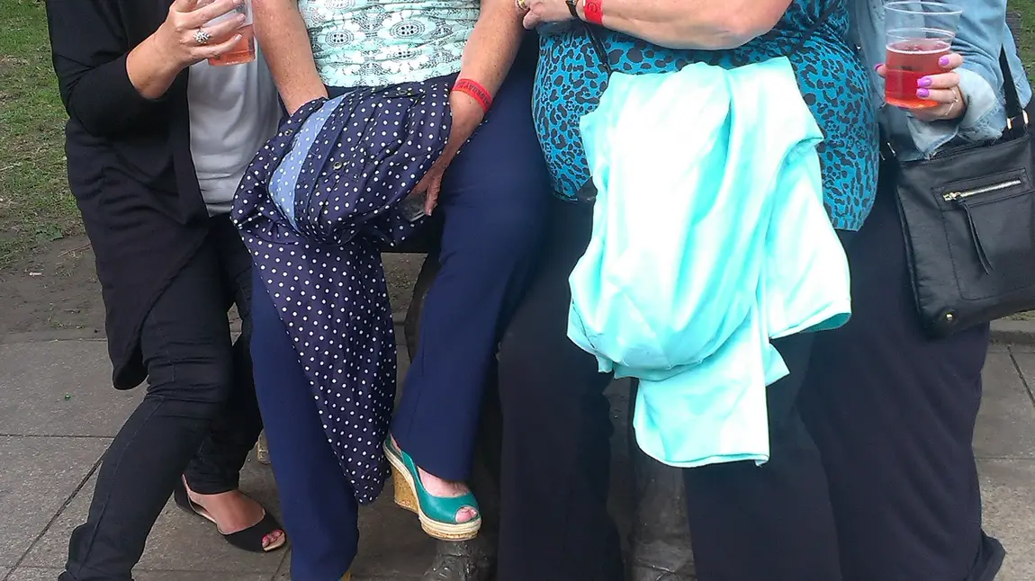 Visitors to the Alan Turing memorial in Manchester