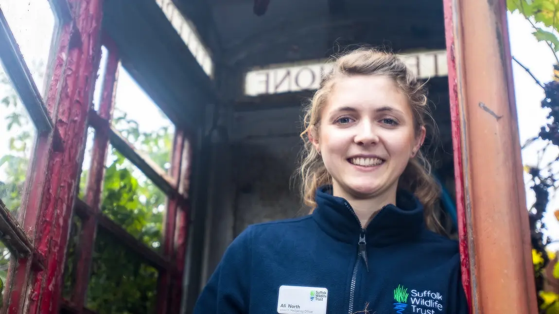 Ali North of Suffolk Wildlife Trust holds a hedgehog