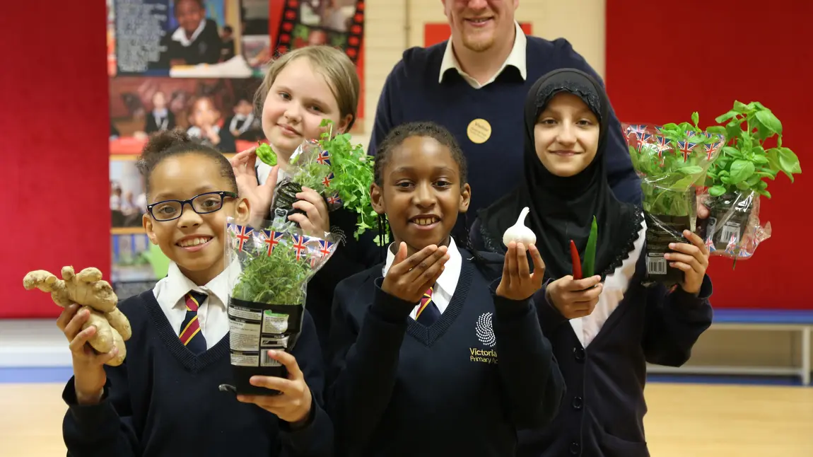 Nick Clitheroe with founding members of Spice Academy