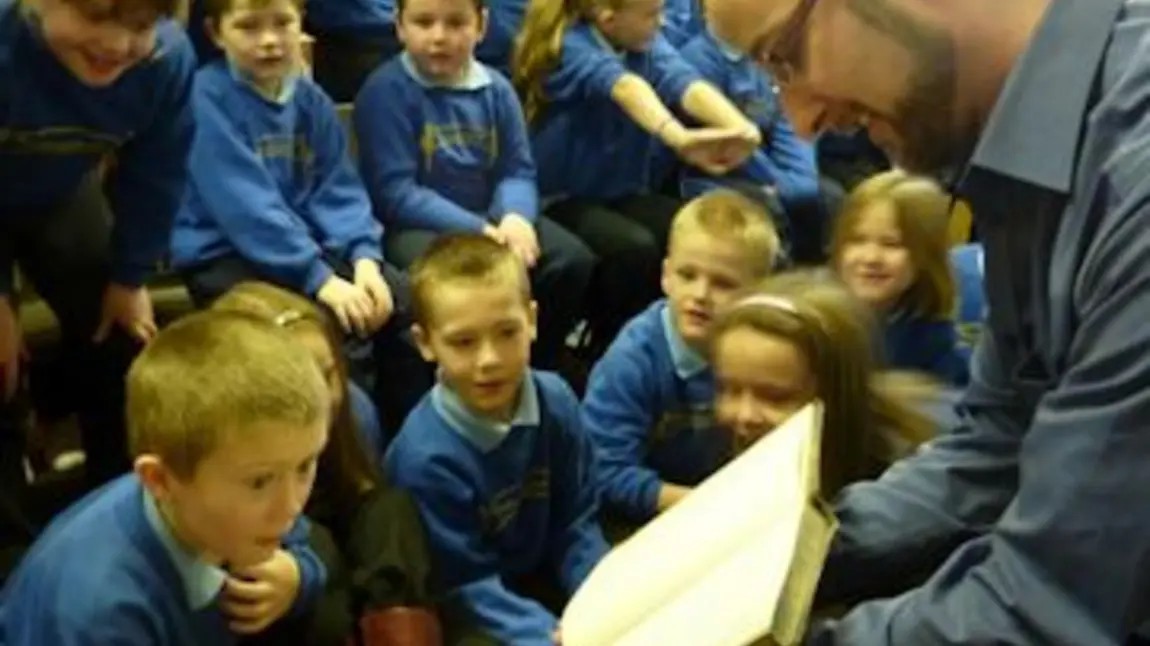 Children participating in learning activities with The Scottish Council on Archive