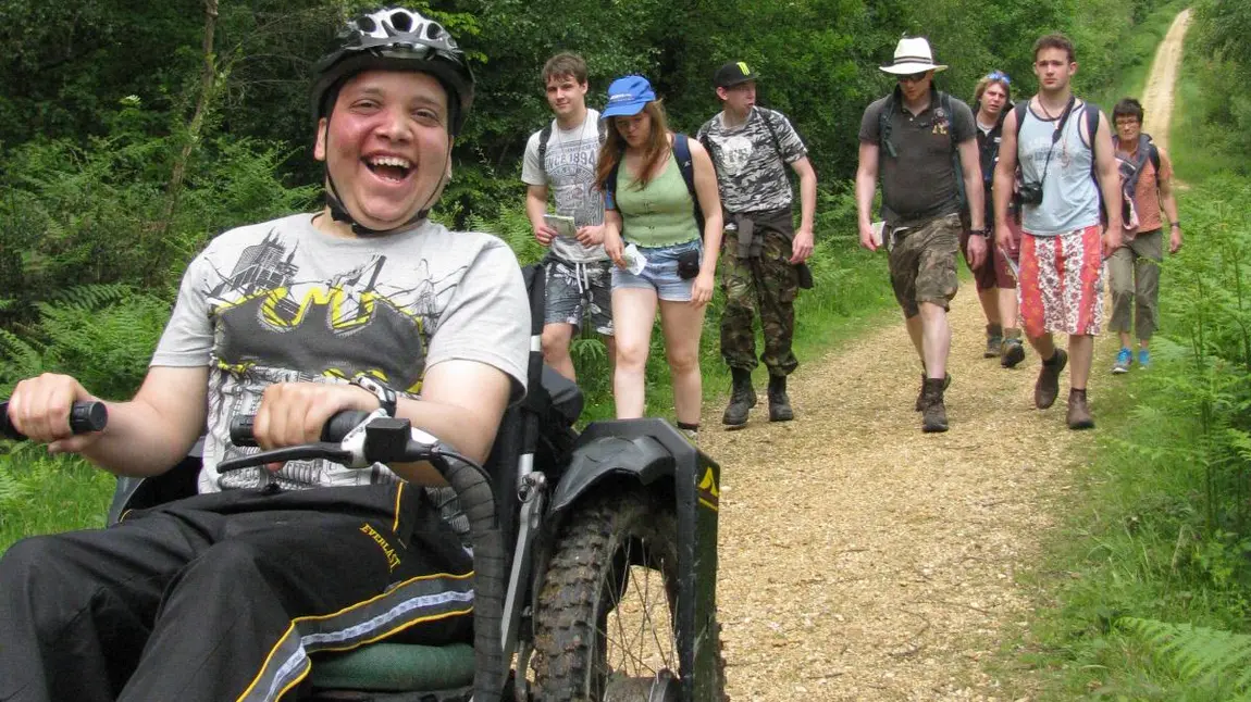 Wheelchair user joining walking group
